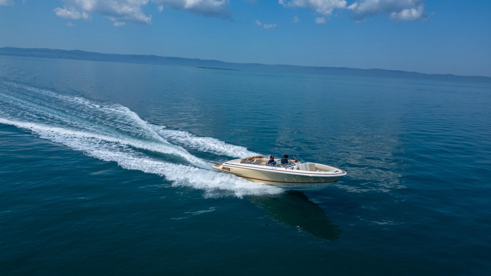 Aerial photo of a boat on open water